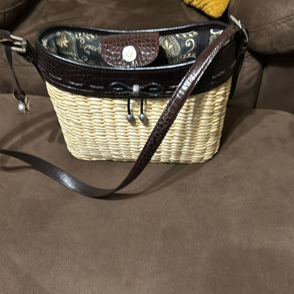 Brighton straw shoulder bag. Used just a few times. Brown trim.